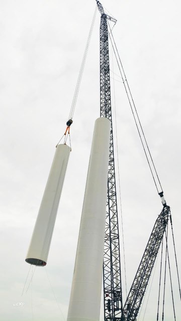 Wind turbine tower being erected