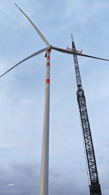 Turbine tower section being lifted